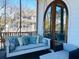 Cozy screened porch with a hanging bed swing and lounge furniture, offering a relaxing outdoor living space at 2040 Ashburton Way, Mount Pleasant, SC 29466