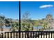 Enjoy the serene view of the marsh and waterway from this inviting screened-in porch at 2040 Ashburton Way, Mount Pleasant, SC 29466