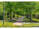 Scenic tree-lined path perfect for walking, jogging, or enjoying a peaceful stroll through the neighborhood at 2040 Ashburton Way, Mount Pleasant, SC 29466