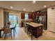 Well-equipped kitchen featuring stainless appliances, granite countertops, and a center island with seating at 205 Grand Palm Ln, Summerville, SC 29485