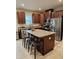 Spacious kitchen with stainless steel appliances, granite countertops, and a kitchen island at 205 Grand Palm Ln, Summerville, SC 29485