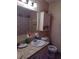 Bathroom featuring a vanity with a sink, mirrored cabinet, and a toilet with a neutral color scheme at 205 Longstreet St, Summerville, SC 29486