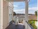 Inviting balcony view overlooking the marsh and beautiful natural scenery at 23 Lowndes Pointe Dr, Charleston, SC 29403