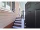 Inviting front entrance showcasing the porch and stairway to the front door at 23 Lowndes Pointe Dr, Charleston, SC 29403