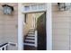 Charming front entrance with stairway leading up to the front porch at 23 Lowndes Pointe Dr, Charleston, SC 29403