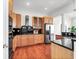 Charming kitchen featuring stainless steel appliances, wood cabinets, and granite countertops at 23 Lowndes Pointe Dr, Charleston, SC 29403