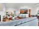 Bright and airy living room featuring hardwood floors, comfortable seating, and seamless flow to the kitchen at 23 Lowndes Pointe Dr, Charleston, SC 29403