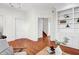 Open-concept living area with beautiful hardwood floors and neutral tones at 23 Lowndes Pointe Dr, Charleston, SC 29403