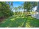 Expansive lawn with a line of trees on a lush green lawn at 2690 Park W Blvd, Mount Pleasant, SC 29466