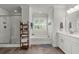 Clean bathroom featuring a separate shower and bathtub, with white cabinets and ample lighting at 2690 Park W Blvd, Mount Pleasant, SC 29466