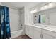Well-lit bathroom featuring a double sink vanity, bathtub, and modern finishes at 2690 Park W Blvd, Mount Pleasant, SC 29466