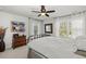 Bright bedroom with a plush bed, ample natural light from the windows, and elegant furnishings at 2690 Park W Blvd, Mount Pleasant, SC 29466