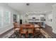 Open dining area with view of the modern kitchen featuring stainless steel appliances and ample counter space at 2690 Park W Blvd, Mount Pleasant, SC 29466