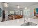Bright kitchen with island, stainless steel appliances and easy access to the dining and living areas at 2690 Park W Blvd, Mount Pleasant, SC 29466