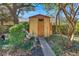 Backyard shed with adjacent bench and decorative skeleton at 29 Wendy Lane, Charleston, SC 29407