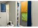 Simple bathroom with open shelving and tiled shower, a practical space for daily routines at 29 Wendy Lane, Charleston, SC 29407