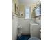Small bathroom featuring white tile, window and vanity, with a colorful rug on the floor at 29 Wendy Lane, Charleston, SC 29407