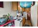 Compact kitchen equipped with essential appliances and ample storage space at 29 Wendy Lane, Charleston, SC 29407