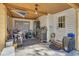 Enclosed patio with beige ceiling and an exterior door, perfect for storage and hobbies at 29 Wendy Lane, Charleston, SC 29407