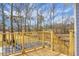 Outdoor back deck featuring a wooden railing with views of a fenced-in backyard and pool at 2901 Newport Pl, North Charleston, SC 29420