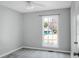 Bright bedroom featuring a ceiling fan and a window with a view of the neighborhood at 2901 Newport Pl, North Charleston, SC 29420