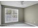 Bedroom with a large window, neutral paint, ceiling fan and carpeted floors at 2901 Newport Pl, North Charleston, SC 29420