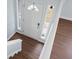 A well-lit entryway featuring a stylish front door and hardwood floors at 2901 Newport Pl, North Charleston, SC 29420