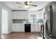 Well-lit kitchen with white cabinets, stainless appliances, and a view from the window above the sink at 2901 Newport Pl, North Charleston, SC 29420