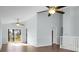 Open living space with two ceiling fans and sliding door access to a private deck at 2901 Newport Pl, North Charleston, SC 29420