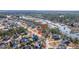 Serene aerial view of a residential area near a waterway, featuring mature trees at 2975 Yachtsman Dr, Mount Pleasant, SC 29466