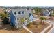 Scenic aerial view of a two-story home with lush landscaping in a peaceful neighborhood at 2975 Yachtsman Dr, Mount Pleasant, SC 29466