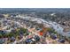 Picturesque aerial view of a charming neighborhood, highlighting well-kept lawns, and mature trees at 2975 Yachtsman Dr, Mount Pleasant, SC 29466