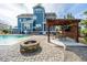Backyard with a pool, patio, pergola, fire pit, and outdoor kitchen at 2975 Yachtsman Dr, Mount Pleasant, SC 29466