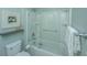 Bathroom features a tub and shower combo with glass doors and shelving at 2975 Yachtsman Dr, Mount Pleasant, SC 29466