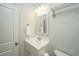Charming half bath with vanity, mirror, and modern lighting at 2975 Yachtsman Dr, Mount Pleasant, SC 29466