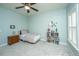 Cozy bedroom with a ceiling fan, carpet, and a window with blinds at 2975 Yachtsman Dr, Mount Pleasant, SC 29466