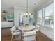 Breakfast nook with round table, four chairs, and lots of natural light at 2975 Yachtsman Dr, Mount Pleasant, SC 29466