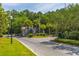 Picturesque guard house entrance to the community, featuring mature trees and landscaping at 2975 Yachtsman Dr, Mount Pleasant, SC 29466