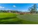 Scenic view of a meticulously manicured golf course with rolling greens and lush landscaping at 2975 Yachtsman Dr, Mount Pleasant, SC 29466