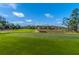 Scenic golf course view featuring lush green fairways and meticulously manicured greens at 2975 Yachtsman Dr, Mount Pleasant, SC 29466