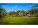 Landscaped community green space with a bench, hedges and manicured lawn at 2975 Yachtsman Dr, Mount Pleasant, SC 29466