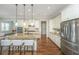 Spacious kitchen with stainless steel appliances, granite countertops, and island seating, perfect for modern living at 2975 Yachtsman Dr, Mount Pleasant, SC 29466