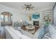 Living room with fireplace, built-in shelves, ceiling fan, and recessed lighting at 2975 Yachtsman Dr, Mount Pleasant, SC 29466