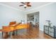 Elegant living room with a grand piano, hardwood floors, and an open view to the dining area at 2975 Yachtsman Dr, Mount Pleasant, SC 29466