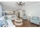Spacious living room flows into kitchen, features a ceiling fan, and recessed lights at 2975 Yachtsman Dr, Mount Pleasant, SC 29466