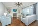 Cozy living room with fireplace, built-in shelves, ceiling fan, and recessed lighting at 2975 Yachtsman Dr, Mount Pleasant, SC 29466