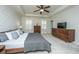 Spacious main bedroom with trey ceiling, wood accents, carpet and ample natural light from shuttered windows at 2975 Yachtsman Dr, Mount Pleasant, SC 29466