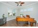 Inviting piano room with natural light, hardwood floors, and a ceiling fan for comfort at 2975 Yachtsman Dr, Mount Pleasant, SC 29466