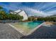 Inviting backyard pool with pristine waters and charming landscaping at 2975 Yachtsman Dr, Mount Pleasant, SC 29466