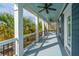 Expansive porch with ceiling fans offers a comfortable outdoor living space at 2975 Yachtsman Dr, Mount Pleasant, SC 29466